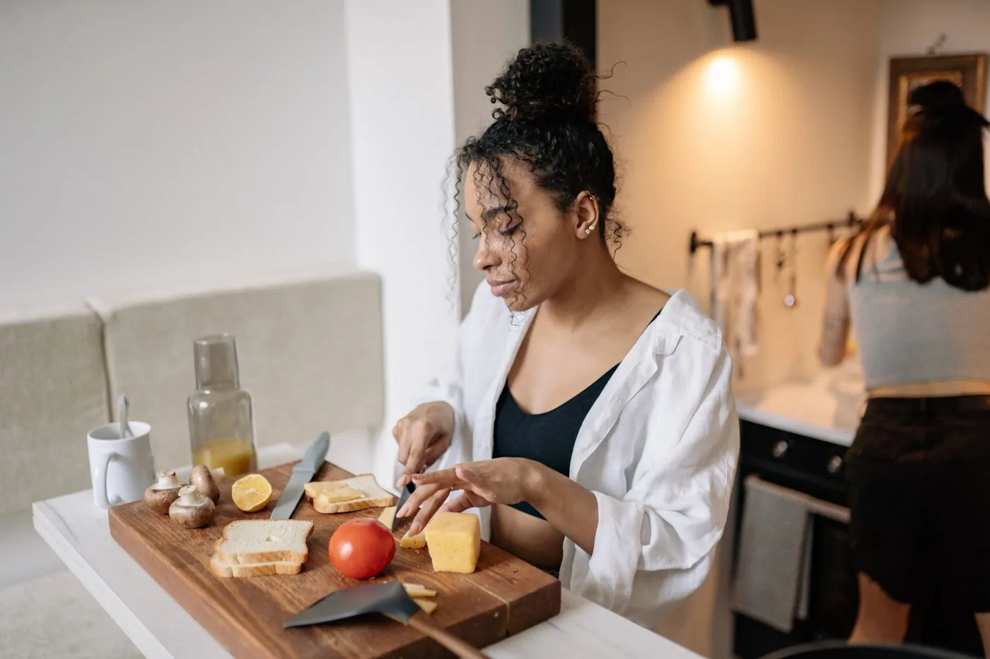Woman preparing healthy food in her kitchen.