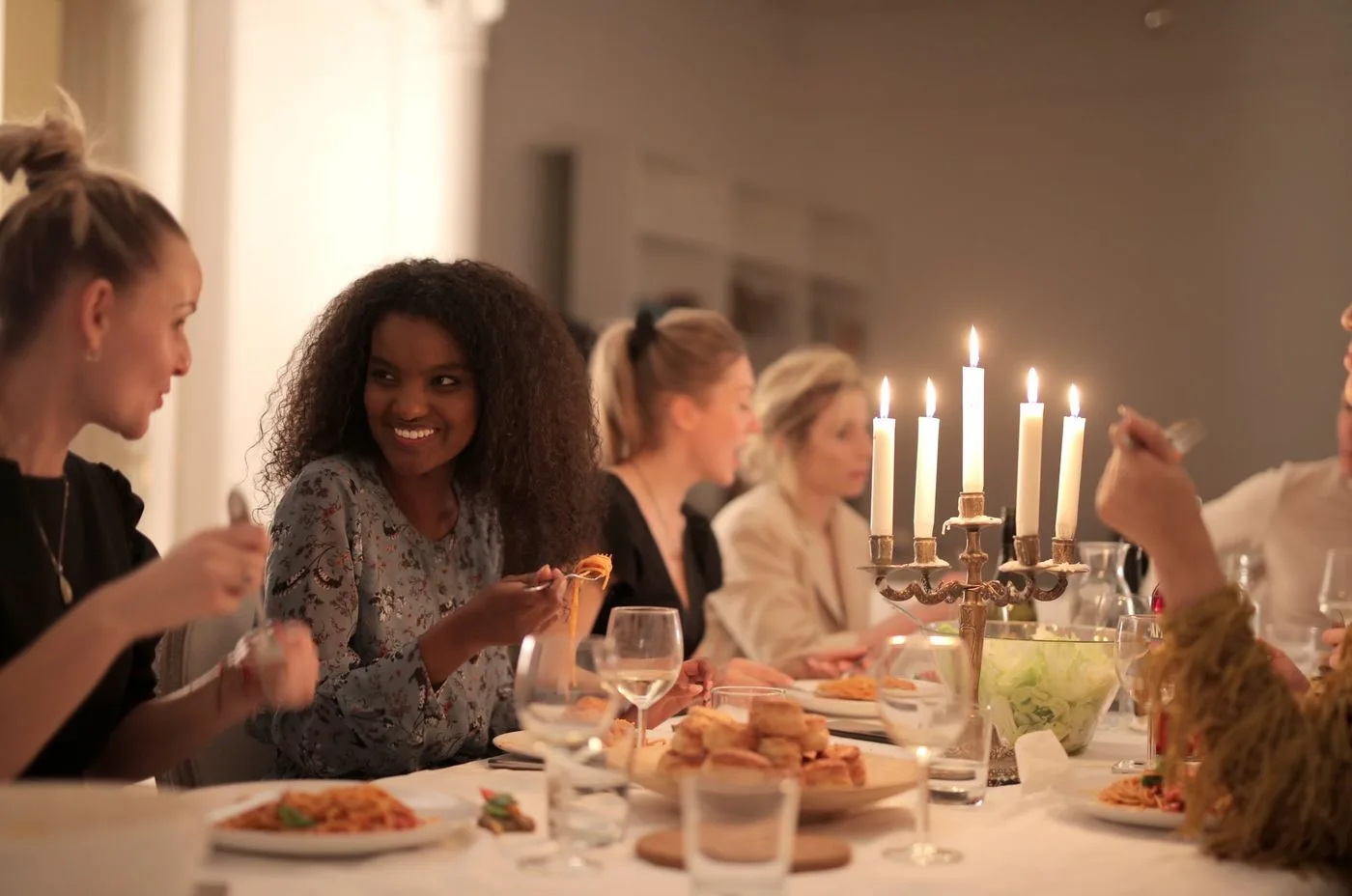 Friends enjoying a meal together without guilt.